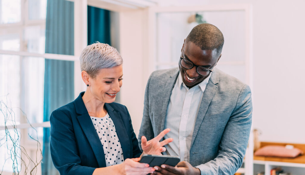 Professionals use software on a tablet to navigate the National Insurance increase