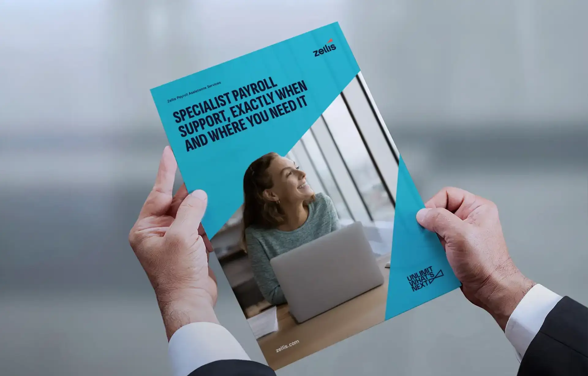 Man holding Zellis Payroll Assistance Brochure